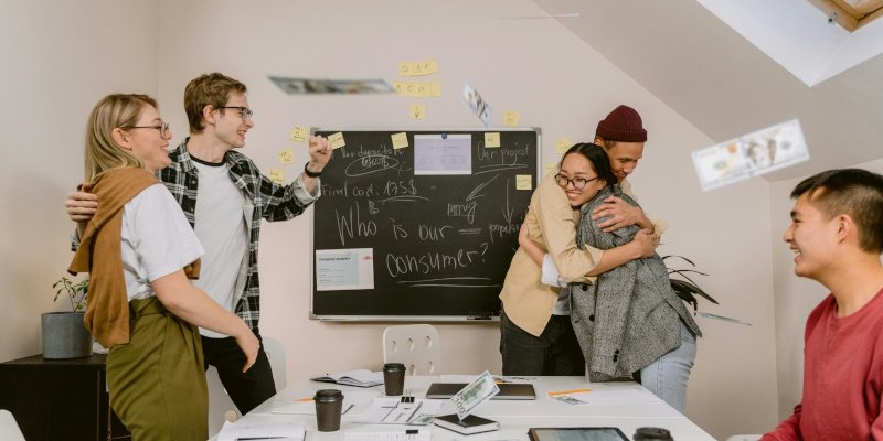 Team celebrating business success